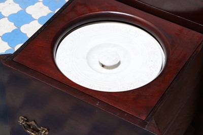 Lot 174 - ☘ A mahogany tray-top night table