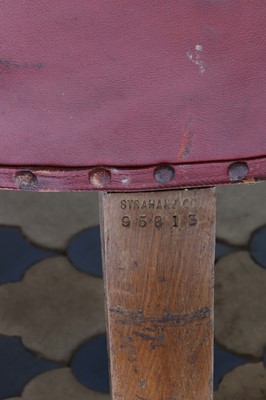 Lot 9 - A red-leather-upholstered tub armchair by Strahan & Co.