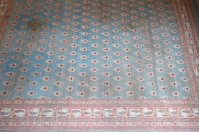 Lot 103 - ☘ A large blue Amritsar carpet