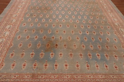 Lot 103 - ☘ A large blue Amritsar carpet