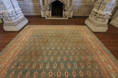 Lot 103 - ☘ A large blue Amritsar carpet