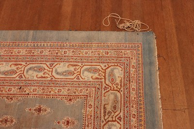 Lot 103 - ☘ A large blue Amritsar carpet