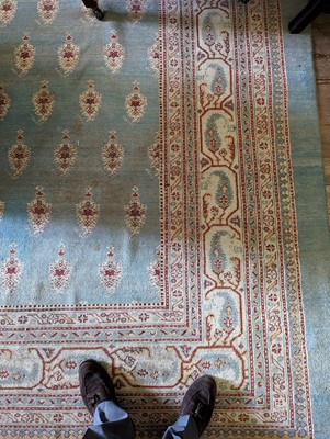 Lot 103 - ☘ A large blue Amritsar carpet