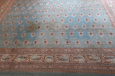 Lot 103 - ☘ A large blue Amritsar carpet