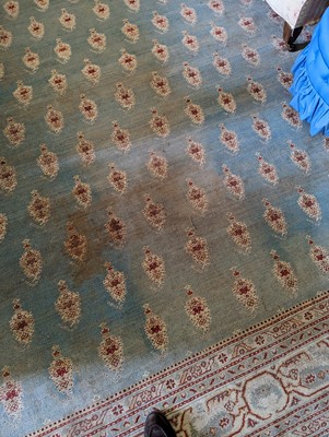Lot 103 - ☘ A large blue Amritsar carpet