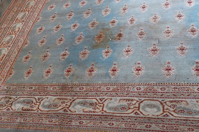 Lot 103 - ☘ A large blue Amritsar carpet
