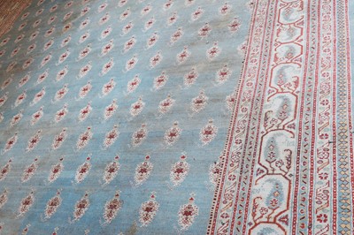 Lot 103 - ☘ A large blue Amritsar carpet