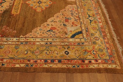 Lot 102 - ☘ A Kurdish wool carpet