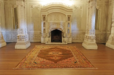 Lot 102 - ☘ A Kurdish wool carpet