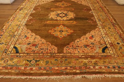 Lot 102 - ☘ A Kurdish wool carpet