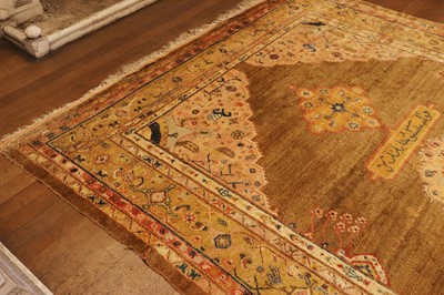 Lot 102 - ☘ A Kurdish wool carpet