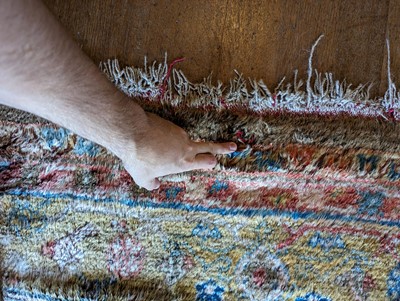 Lot 102 - ☘ A Kurdish wool carpet