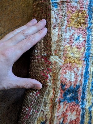 Lot 102 - ☘ A Kurdish wool carpet