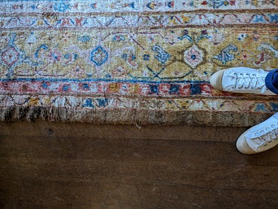 Lot 102 - ☘ A Kurdish wool carpet