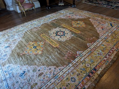 Lot 102 - ☘ A Kurdish wool carpet