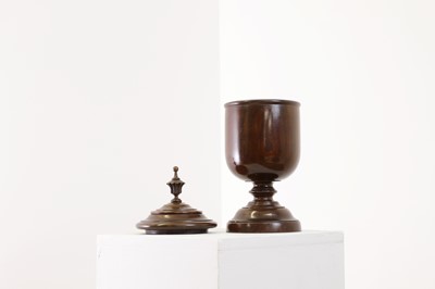 Lot 497 - A lignum vitae wassail cup and cover