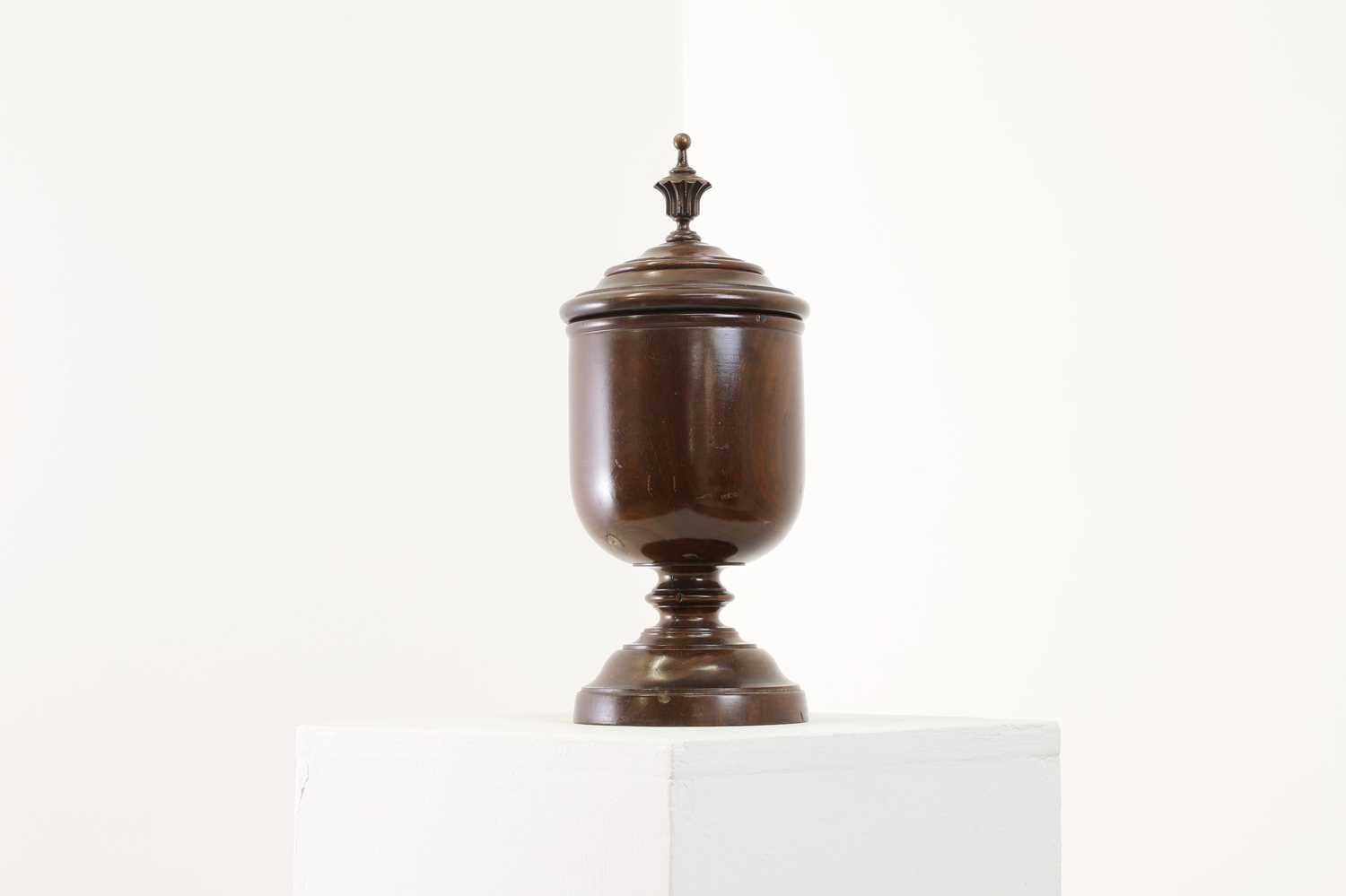 Lot 497 - A lignum vitae wassail cup and cover