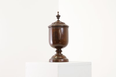 Lot 497 - A lignum vitae wassail cup and cover