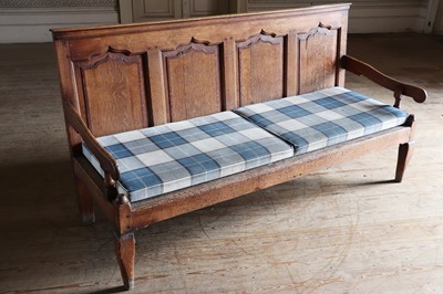 Lot 75 - A George III oak and mahogany crossbanded settle