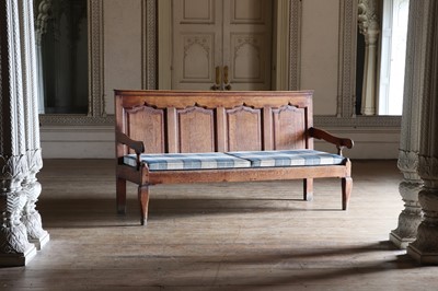 Lot 75 - A George III oak and mahogany crossbanded settle