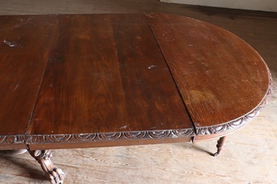 Lot 72 - ☘ An oak oval extending pedestal dining table