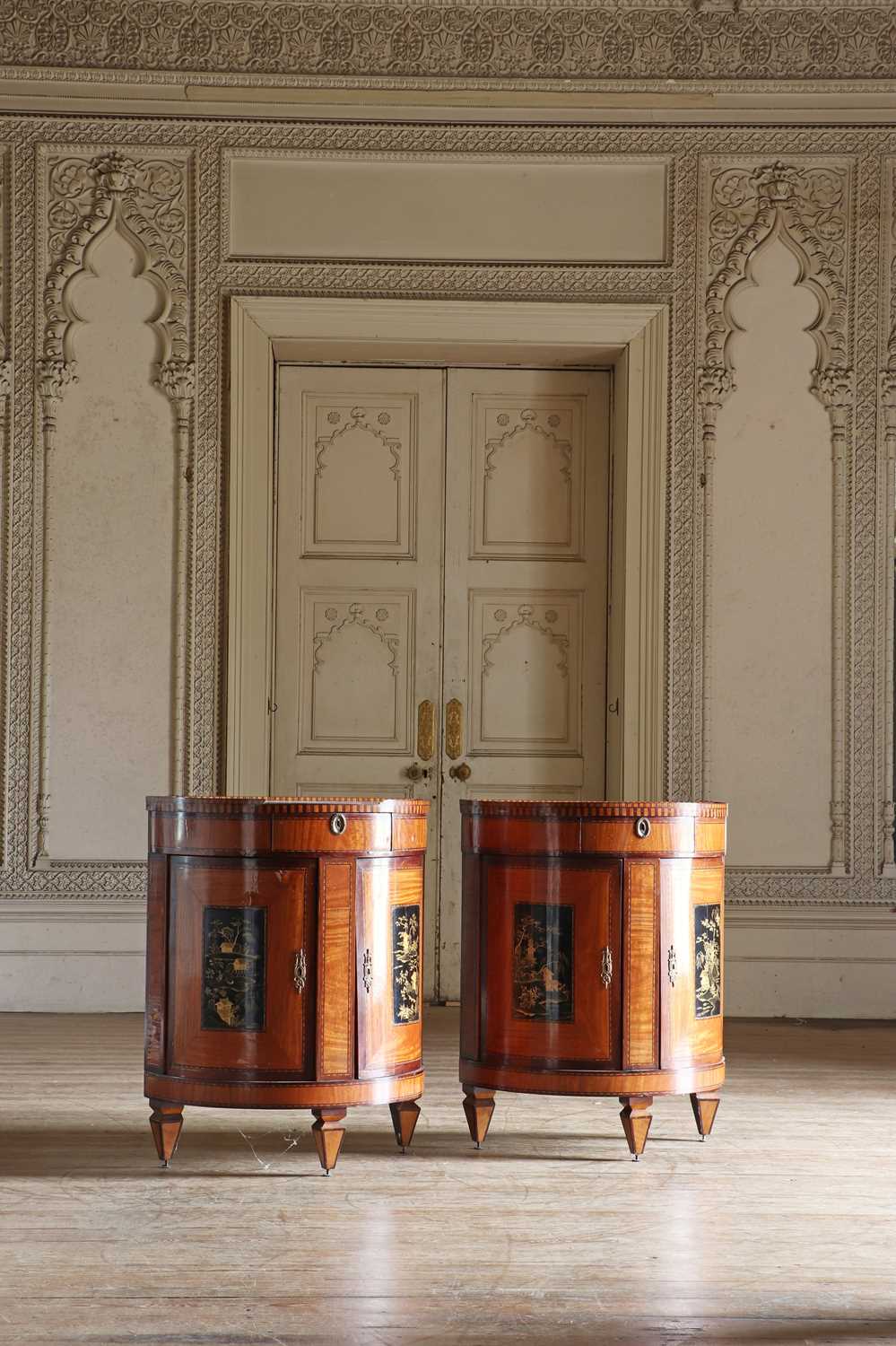 Lot 64 - ☘ A pair of Dutch satinwood bow-front pier cabinets