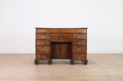 Lot 10 - A camphor wood and brass campaign desk
