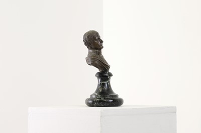Lot 335 - A small patinated bronze bust of Napoleon