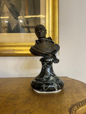 Lot 335 - A small patinated bronze bust of Napoleon