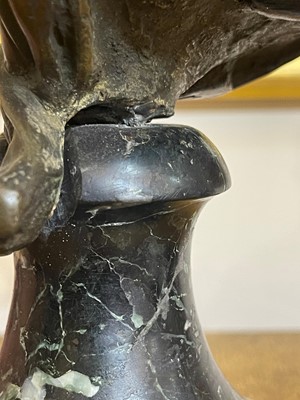 Lot 335 - A small patinated bronze bust of Napoleon