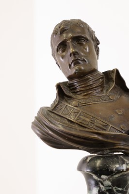 Lot 335 - A small patinated bronze bust of Napoleon