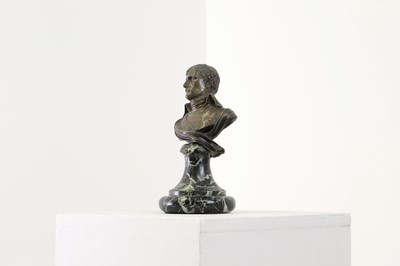 Lot 335 - A small patinated bronze bust of Napoleon