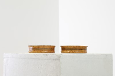 Lot 128 - A pair of burr fruitwood coasters