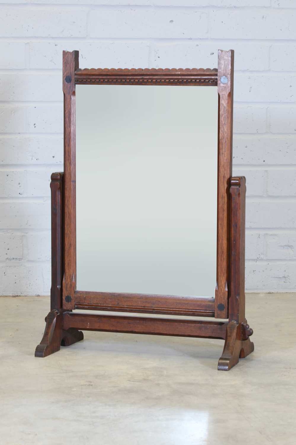 Lot 8 - An Arts and Crafts oak dressing mirror