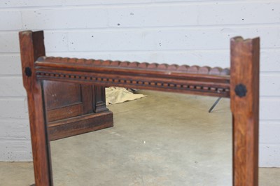 Lot 8 - An Arts and Crafts oak dressing mirror