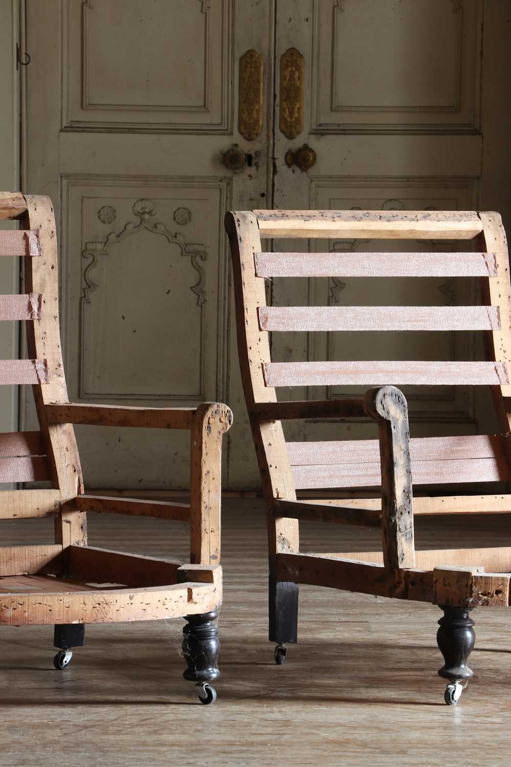 Lot 40 - A matched pair of Victorian armchair frames