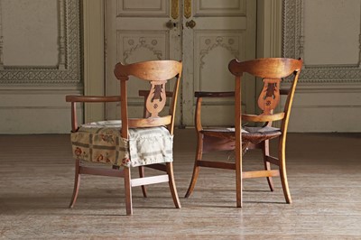 Lot 61 - ☘ A composed set of fourteen Biedermeier walnut dining chairs