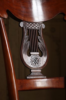 Lot 61 - ☘ A composed set of fourteen Biedermeier walnut dining chairs