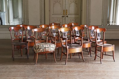 Lot 61 - ☘ A composed set of fourteen Biedermeier walnut dining chairs