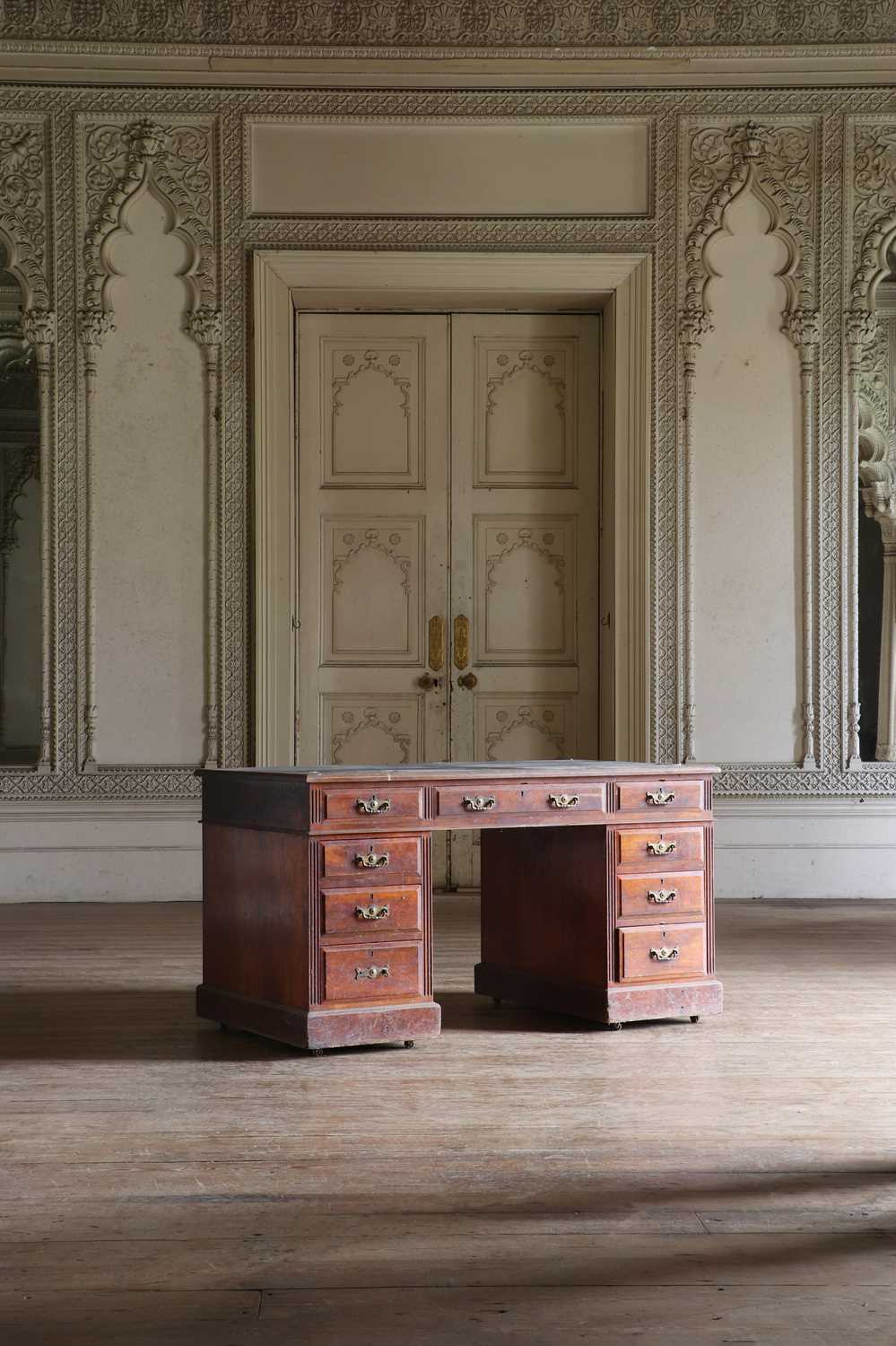 Lot 41 - A Victorian walnut pedestal desk
