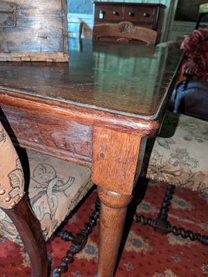 Lot 85 - A large oak refectory table