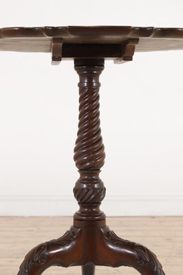 Lot 130 - A George III-style carved mahogany tripod table
