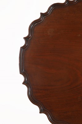 Lot 130 - A George III-style carved mahogany tripod table
