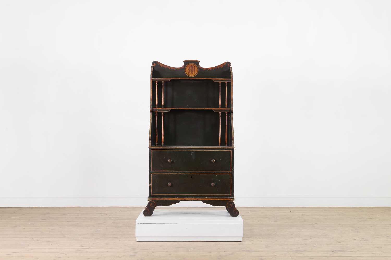 Lot 256 - A painted wooden waterfall bookcase