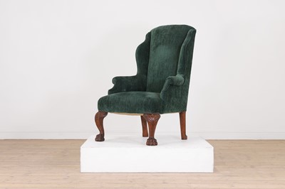 Lot 48 - A George II-style walnut wingback armchair