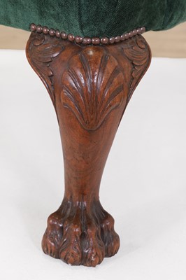 Lot 48 - A George II-style walnut wingback armchair