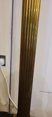 Lot 14 - A near pair of telescopic brass column floor lamps