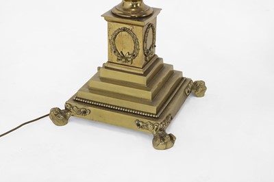 Lot 14 - A near pair of telescopic brass column floor lamps