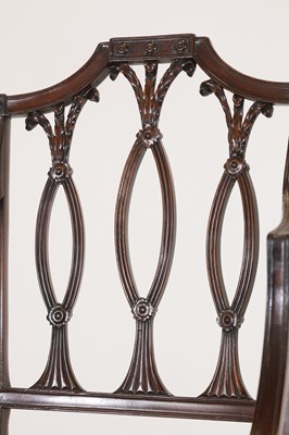 Lot 54 - A set of eight George III-style mahogany dining chairs