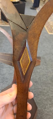 Lot 80 - A near pair of Directoire-style mahogany vide poches